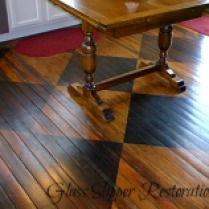 Hand-stained checkerboard long-leaf pine flooring