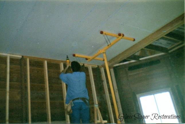 Gary installing drywall in dining room